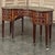 19th Century French Louis XVI Kidney-Shaped Mahogany Leather Top Desk is a stunning example of the refinement of...