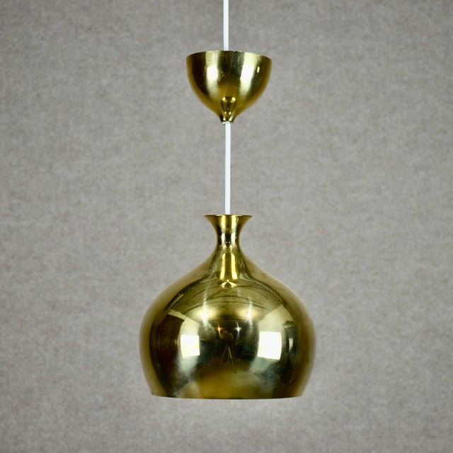 A pair of ceiling lamps by Helge Zimdal for Falkenbergs Belysning AB. The model is called the "Onion". Including the...