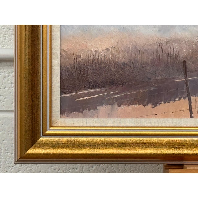 Brown A serene river landscape at dawn with misty trees and soft, warm morning light 1987 Circa For Sale - Image 8 of 18