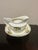 A charming antique English gravy boat and matching underplate crafted by W.H. Grindley & Co. in the sought-after Chelsea...