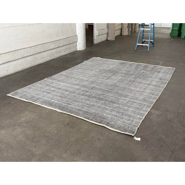 Design Plus Gallery presents a 9ft x 12ft Modern Wool Carpet. This contemporary floor covering is composed of wool and...