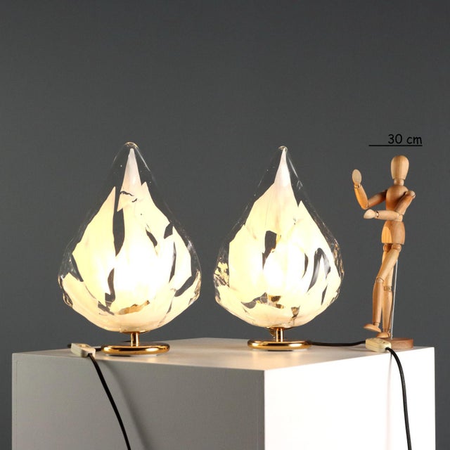 Pair of La Murrina table lamps in worked Murano glass; base and structure in iron and brass. This piece is attributed to...