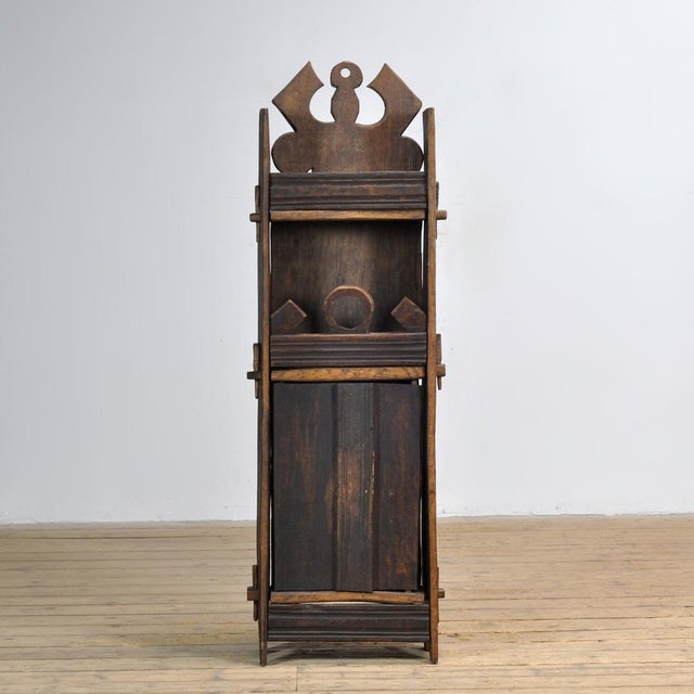 This Romanian folk art cabinet from the 1950s is a remarkable example of traditional Eastern European craftsmanship....