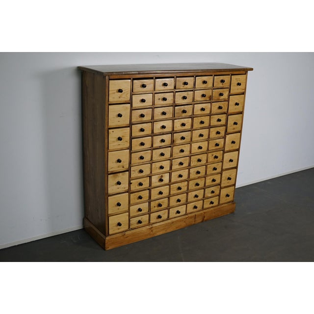 This apothecary cabinet of drawers was designed, circa 1950s in the Netherlands. The piece is made from pine and features...
