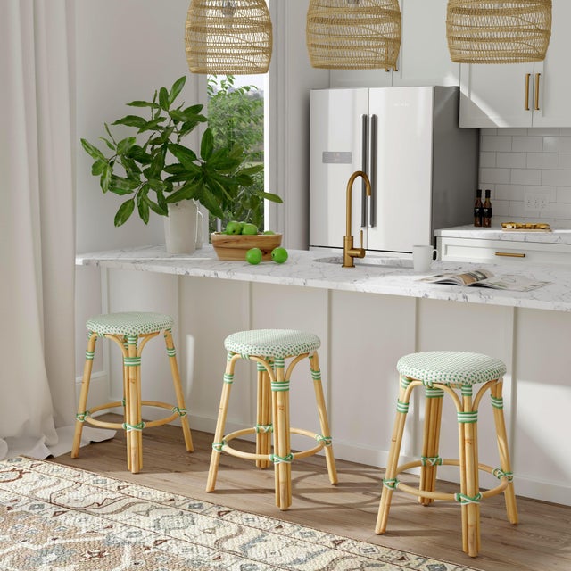 Evoking images of sidewalk tables in the Cote d'Azur, counter stools like this will give your kitchen or patio the casual...