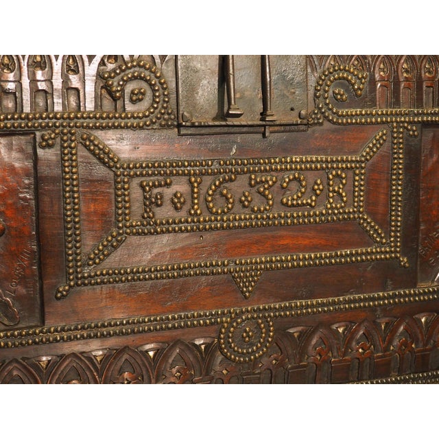 A Fascinating 17th Century Carved and Iron Studded French Trunk, Dated 1632 For Sale - Image 4 of 18