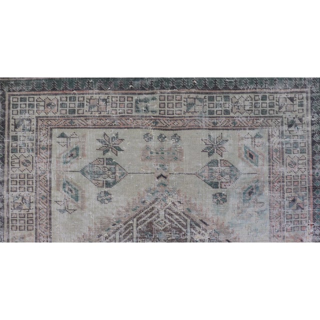 Vintage Persian Heriz Distressed Rug With Muted Colors & Medallion Design For Sale - Image 9 of 12