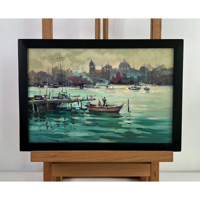 Oil painting Evening over the Pier with boats Yuriy Suprunchuk reveals a poetic harbor scene bathed in soft evening light....
