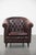 This beautiful Chesterfield-style club armchair fits easily into almost any interior and has a classic yet timeless look....