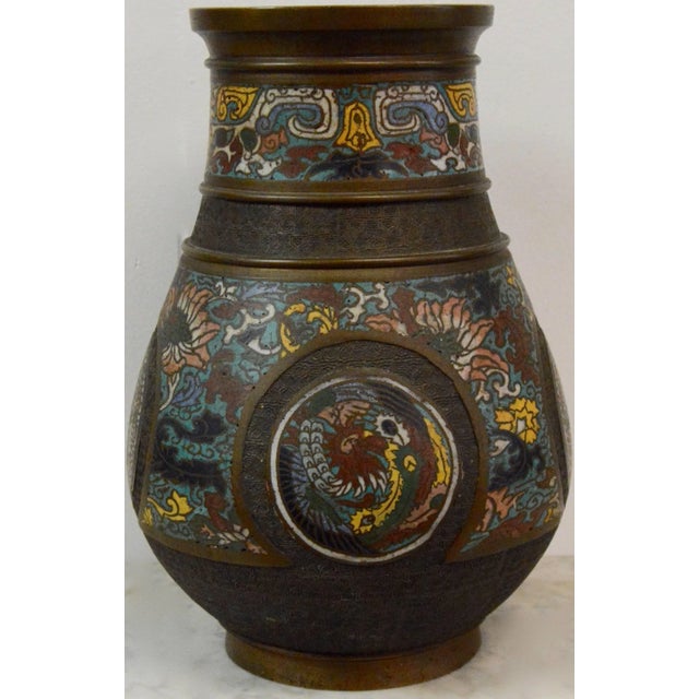 We are offering an Edo Period (1603-1867) Japanese cloisonné bronze vase. The vase has colorful floral and patterned...