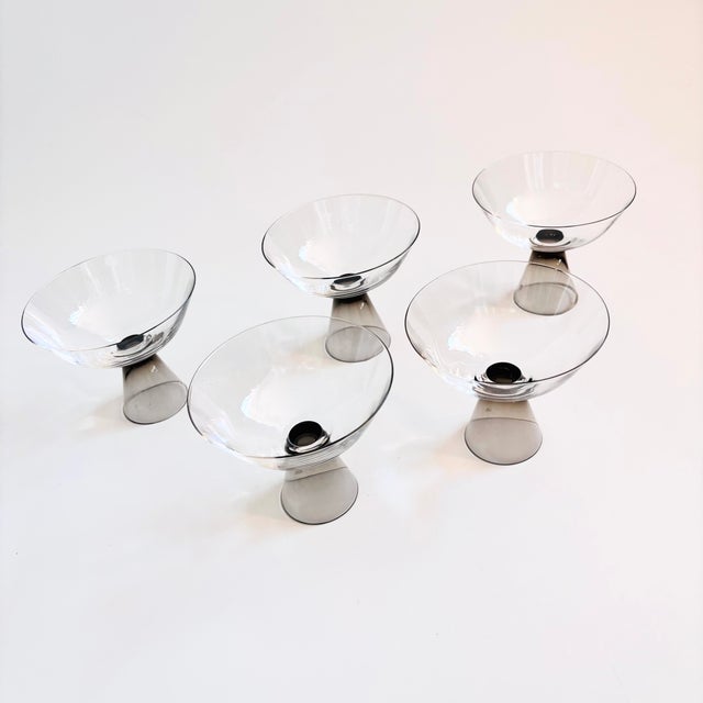 A set of 5 mid century coupe glasses made in Germany by Rosenthal. Made in the "Fortuna Smoke" pattern, designed by Elsa...