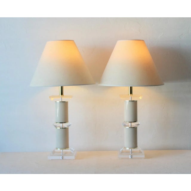 Post-Modern Optique Co. Style Stacked Lucite Glam Table Lamps-a pair Clear and frosted lucite, painted metal bands with...