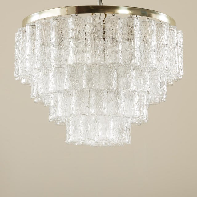 This vintage large chandelier, based on the glasswork, was designed by toni zucceri and made in the 1960s by venini. The...