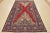 An authentic semi-antique traditional Tabriz rug, hand-knotted with an all-wool pile on a cotton foundation. This oriental...
