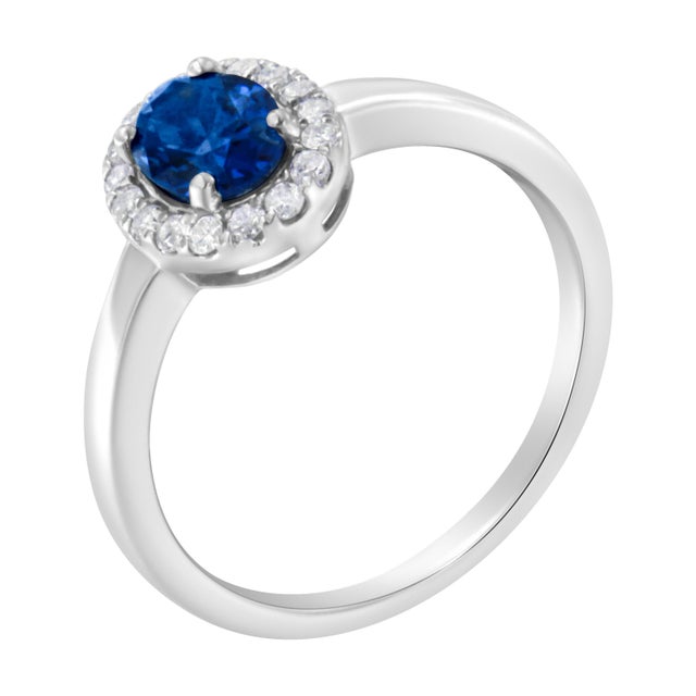 Contemporary 10K White Gold 1/5 Cttw Round Diamond and Prong Set 7MM Created Blue Sapphire Halo Cocktail Ring (H-I Color, I1-I2 Clarity) - Size 7 For Sale - Image 3 of 6