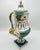 A rare 19th-century Sèvres-style porcelain urn, standing 41 cm tall and finished in a striking bleu céleste turquoise...