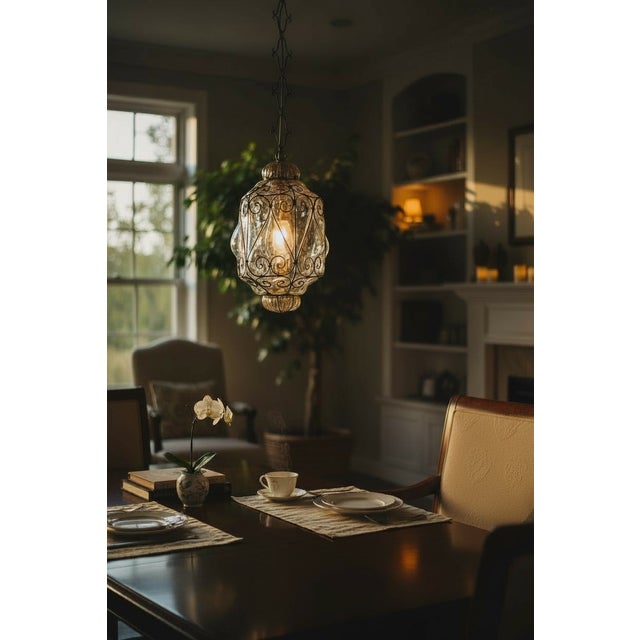 Wrought Iron Murano Glass Latern 1950’s Hand blown Murano Glass Height without chain 50 cm Width 30 cm Features 1 light...