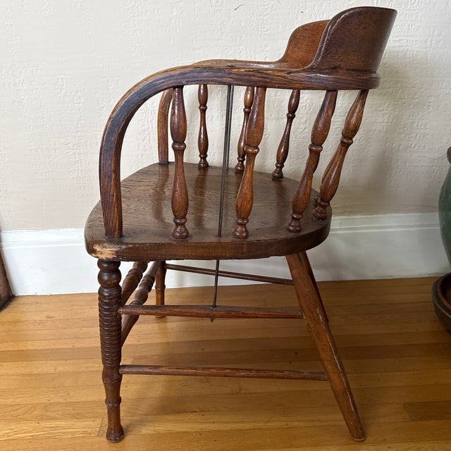My dad bought this chair at an auction in the 1970’s and sat on it proudly at the dining table for years. We are...