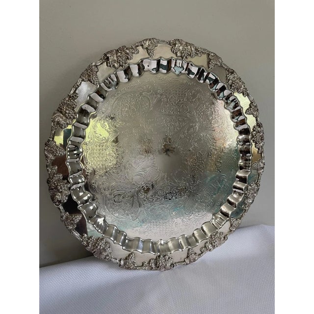 A superb Victorian style large round English Silverplated Tray or Platter ornately decorated with stylized grape motifs...