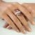 This Art Nouveau-inspired cocktail ring is crafted in 925 sterling silver and showcases 10 pear-cut rubies totaling 1.77...
