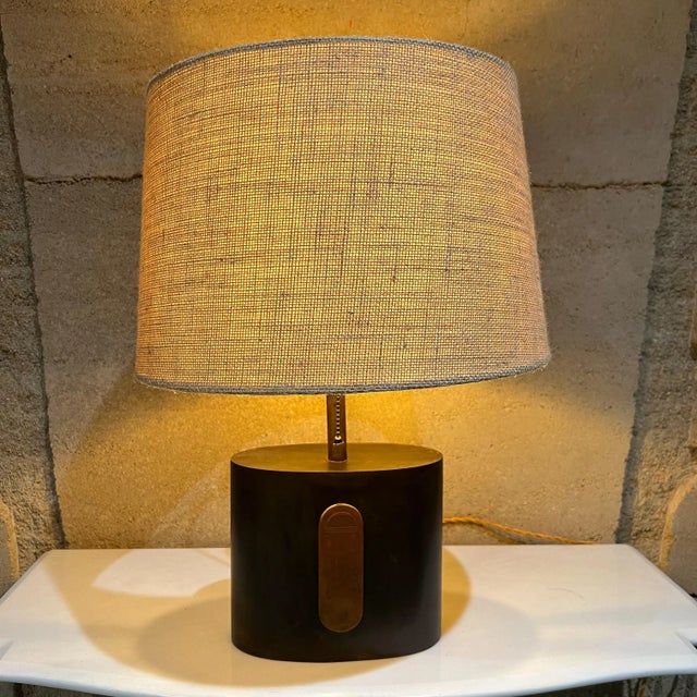 AMBIANIC presents 1950s Laris Refined Modern Table Lamp Brass and Copper Elegant Simplicity Stamp appears as Laris...
