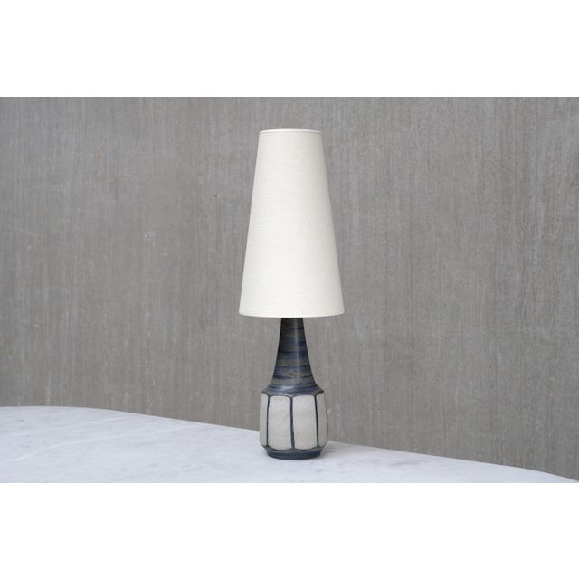This rare table lamp was designed by Marianne Starck and produced by Michael Andersen & Son in Bornholm, Denmark in the...