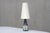 This rare table lamp was designed by Marianne Starck and produced by Michael Andersen & Son in Bornholm, Denmark in the...