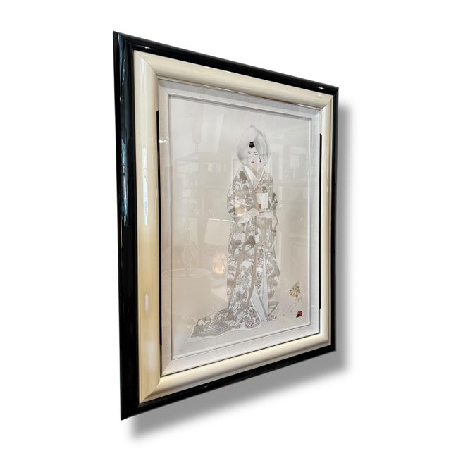 A striking signed and numbered artwork by Japanese artist Hisashi Otsuka, depicting an elegant woman in an intricately...