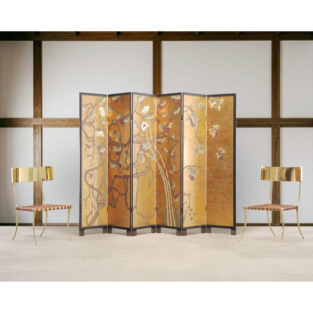 An incredible and luxurious pair of Greco-Roman klismos-form dining chairs crafted out of solid polished brass and woven...