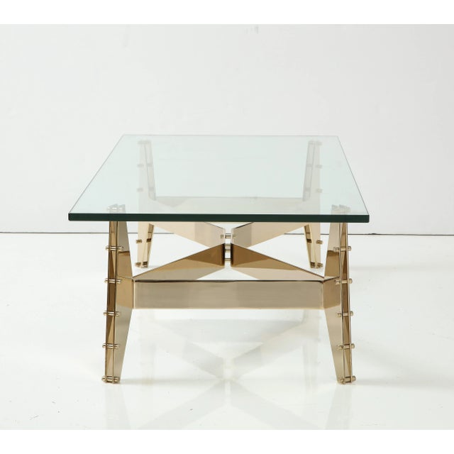 Beautiful architectural steel brass plated base with 3/4'' inch thick polished glass top coffee table, made and designed...