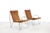 A beautiful set of minimalist lounge chairs, designed by Verner Panton and produced by Fritz Hansen in Denmark. Crafted...