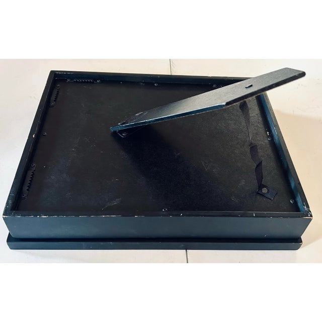 This elegant evening bag is from the 1920s, made of woven fabric on the outside with a silky interior and ruffle top...