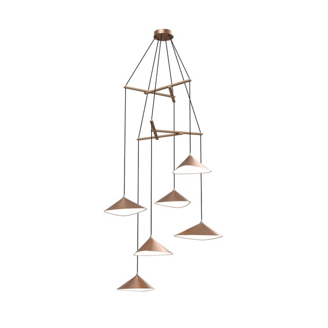 Emily is a series of handmade sheet steel lampshades in various finishes and spatial arrangements. The Vertical models of...