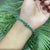 Contemporary 9.18 Ct Round Cut Emerald Line Tennis Bracelet - May Birthstone Gift For Sale - Image 10 of 13