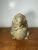Ceramic hedgehog figurine with a cute, detailed design. Charming animal statue perfect for shelf display, home décor, or...