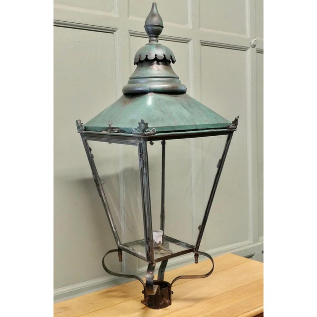 This is a Large Copper Street Light Lantern, it has glazed sides and sits on an iron fitting bracket This is a superb...