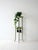 Elegant painted wooden pedestal, with slender and refined lines, ideal for plants or decorative objects. The light and...