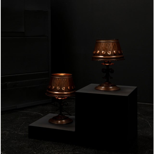 A pair of rustic table lamps from the 1960s, characterized by the clear austerity of Brutalism while also exuding a warm,...