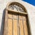 An extraordinary pair of vintage Italian doors. Beautiful tall doors with coordinating working transom window above. Thr...