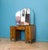 Burr walnut dressing table with a bold grain across the drawers and top. Six drawers with a central drawer, all fitted...