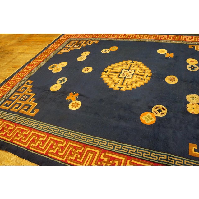 Antique Art Deco Chinese Medallion Navy 1920s Rug, Circa Date: 1920s. This exceptional piece captures the fusion of...