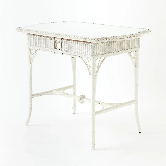 - Discovered in a Newport, Rhode Island estate, this lovely wicker table has coastal charm in spades. - We love the...