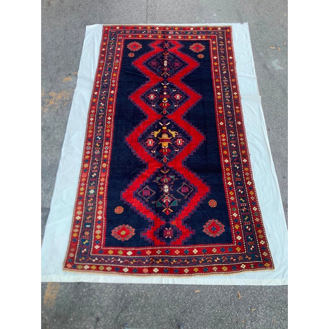 An exceptional antique Borchalu Kazak rug from the Caucasus, circa 1870, featuring a bold geometric composition of stepped...
