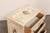 An Italian Neoclassical style, small-sized, hand-painted serpentine chest, from the mid 20th century. This vintage chest...