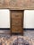 This is a lovely, high-quality vintage oak nightstand or compact chest of drawers that beautifully captures the essence of...