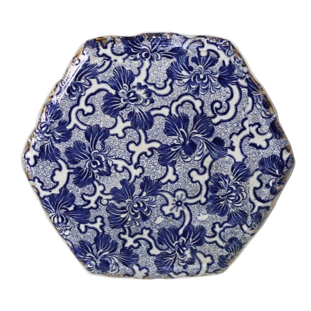 Antique European glazed porcelain garden table. Decorated with cobalt blue and white with gold accents. Made in the Minton...