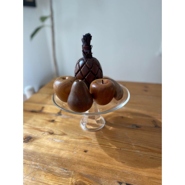 Set of hand-carved wooden fruit on a vintage glass stand. Perfect for your kitchen!