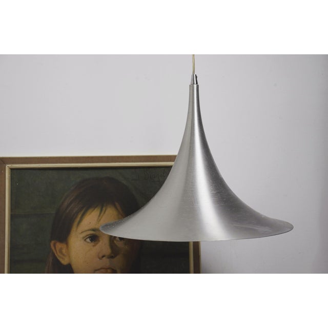 Brushed aluminum trumpet pendant lamp with a dramatic almost half-metre flared tulip silhouette, strong mid-century Space...