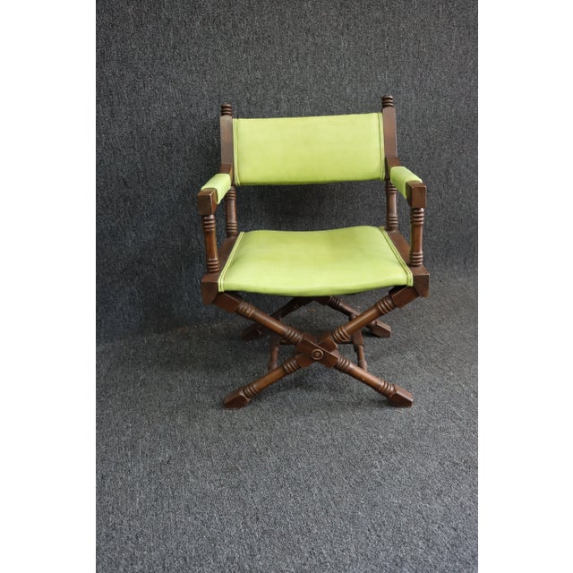 Walnut Carved Director's Chair, turned and block frame and x-base, green neon upholstered seat, back and partial arms
