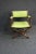 Walnut Carved Director's Chair, turned and block frame and x-base, green neon upholstered seat, back and partial arms